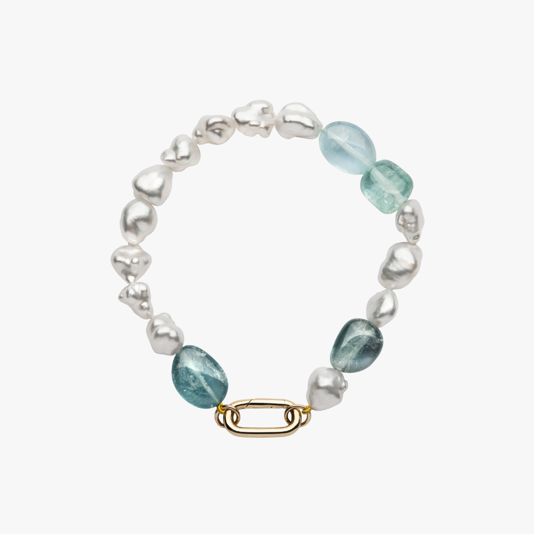 Handmade Keshi South Pearl and Blue Tourmaline gemstone beaded bracelet with 9kt gold hinged clasp for adding your own charms.