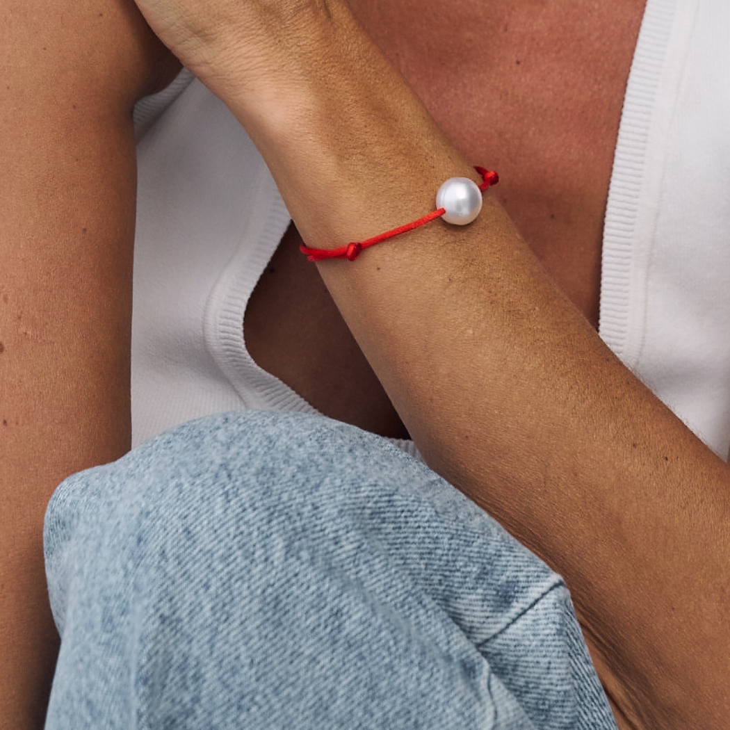 12-13mm South Sea Pearl on red satin