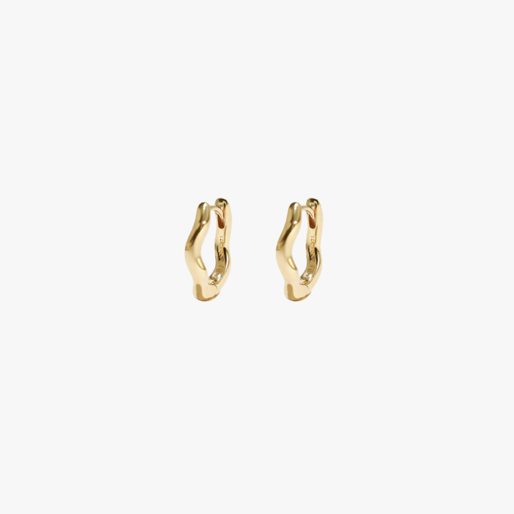 9k yellow gold wave huggies on a white background