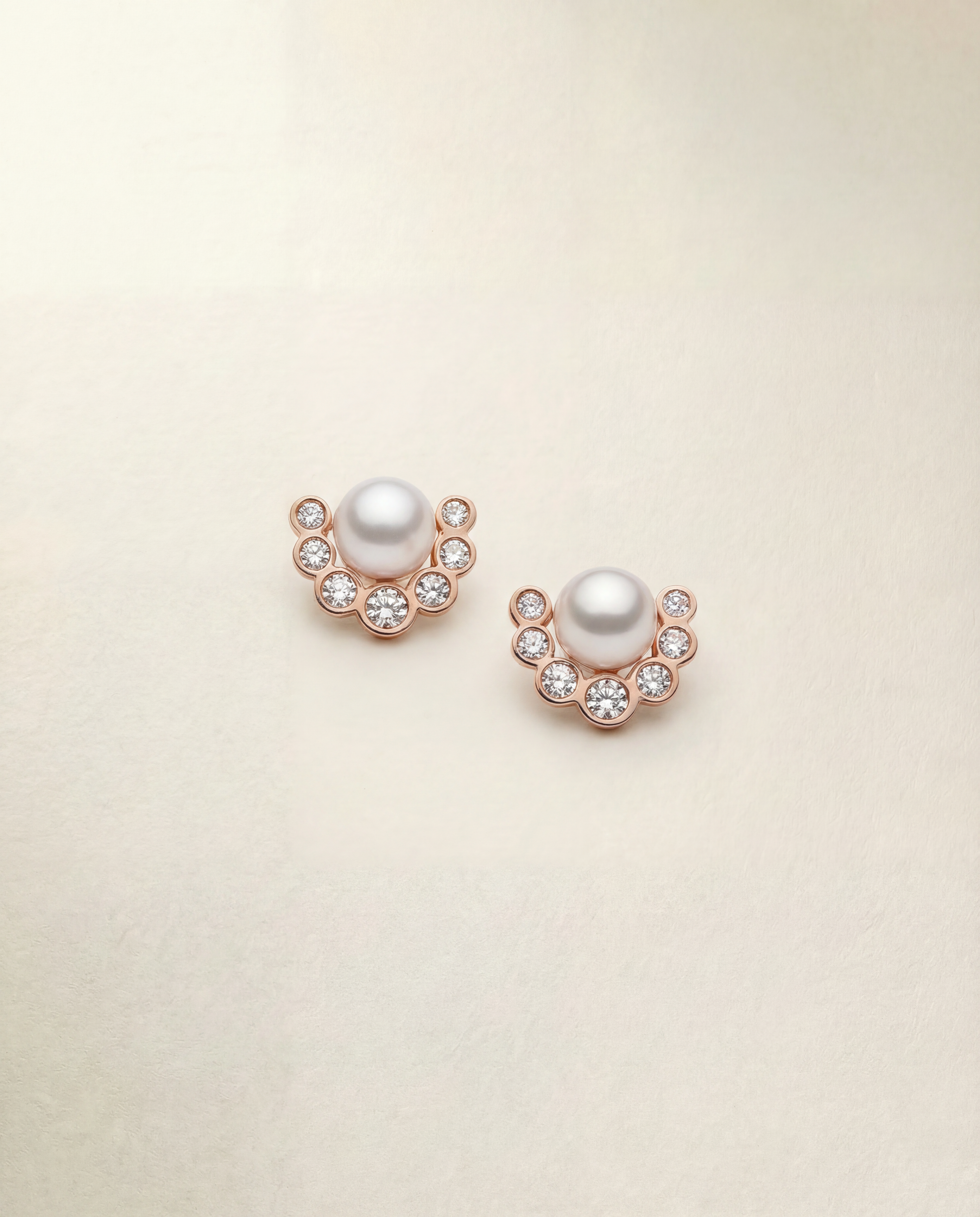 Pearl and diamond earring studs