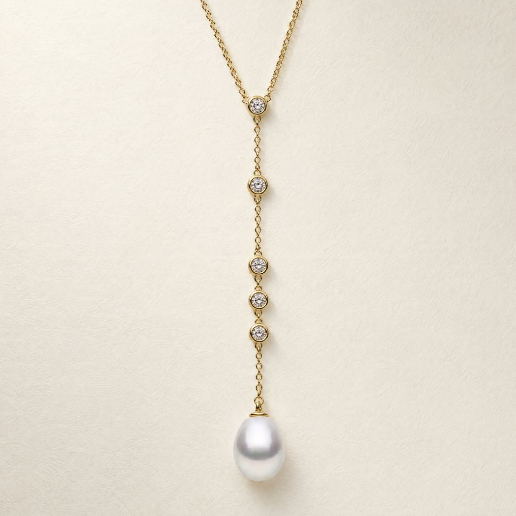 Portia Necklace — 18k gold vermeil lariat necklace with an 8-9mm South Sea pearl and bezel-set white diamonds, AUTORE MODA