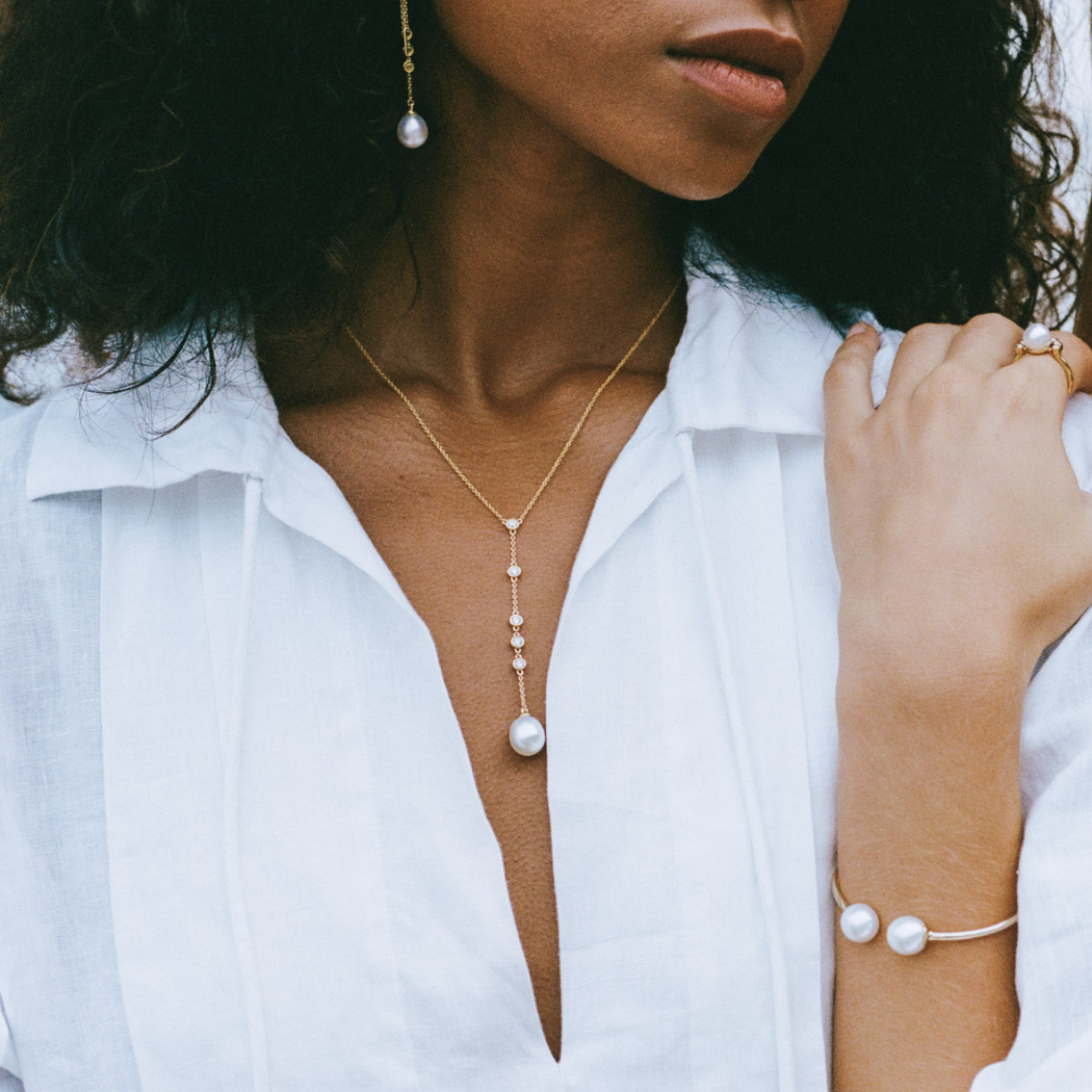 Portia Necklace — 18k gold vermeil lariat necklace with an 8-9mm South Sea pearl and bezel-set white diamonds, AUTORE MODA