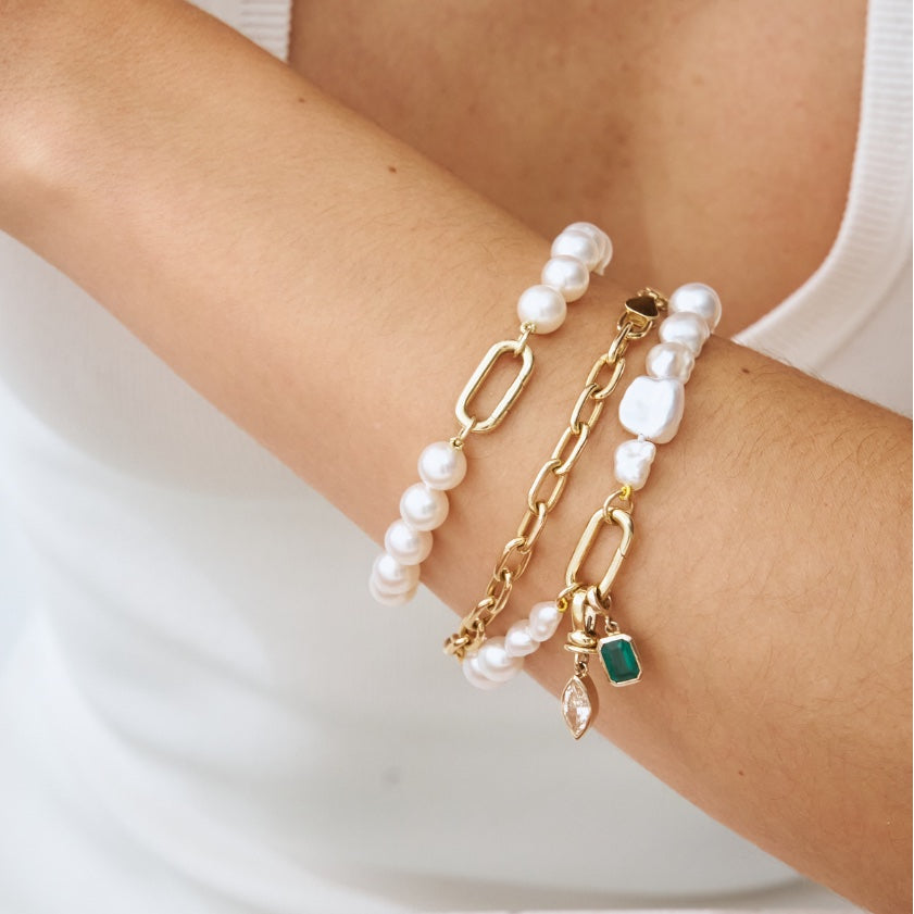wrist wearing handmade South Sea Keshi pearl bracelets
