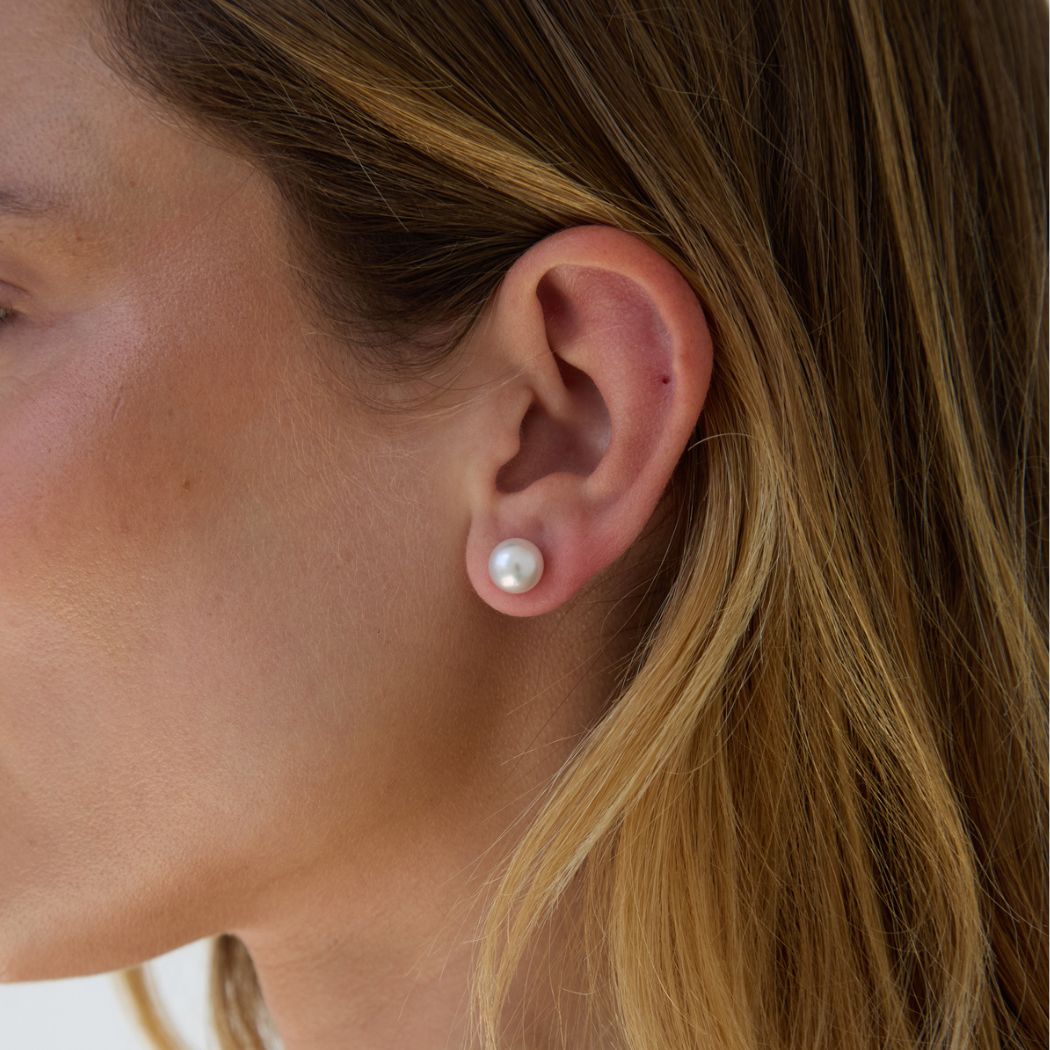 Pair of south sea pearl stud earrings on model