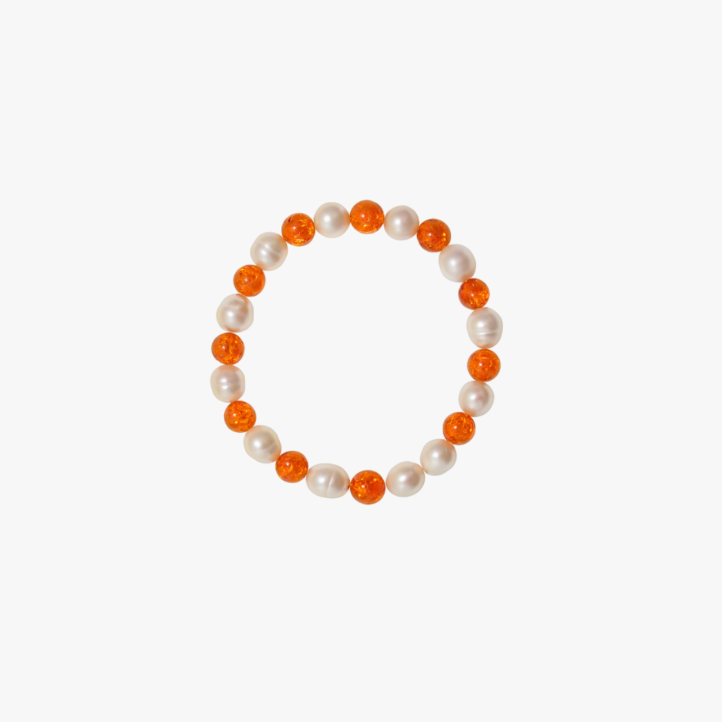 South sea pearl bracelet with alternating amber beads on elastic 