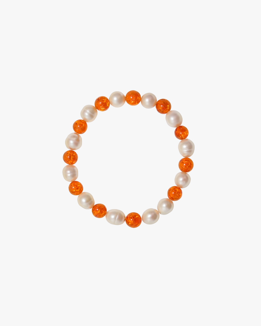 South sea pearl bracelet with alternating amber beads on elastic 
