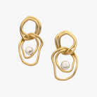 Matte 18k Yellow Gold Vermeil earrings with South Sea Keshi pearl centres on a white background