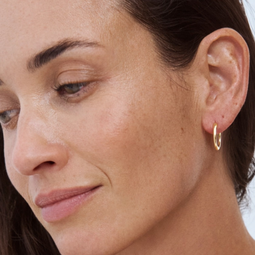 Form Huggies worn on model – 9k gold huggie earrings, Autore Moda