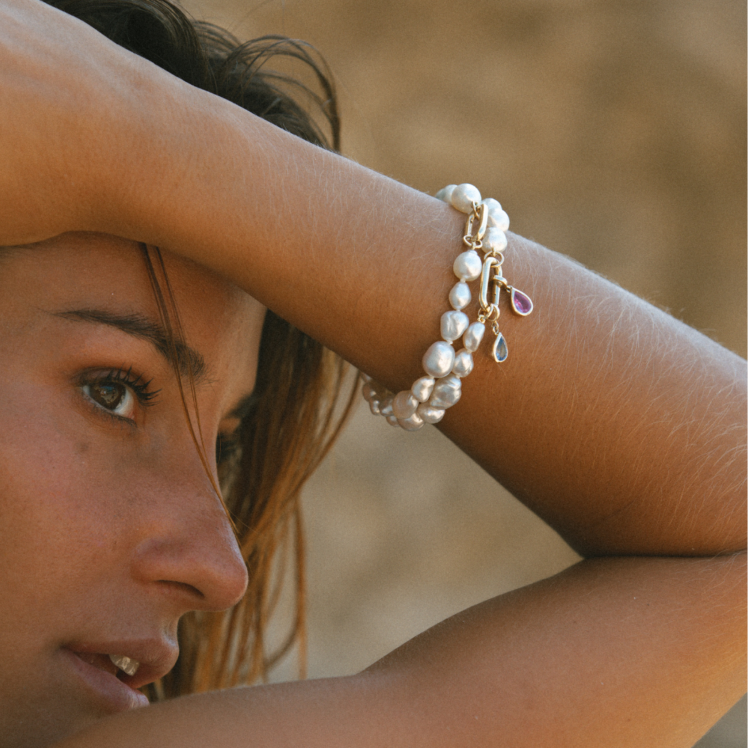 Handmade South Sea Keshi pearl bracelets with 9k gold clasp and Pink and Blue Sapphire charms.