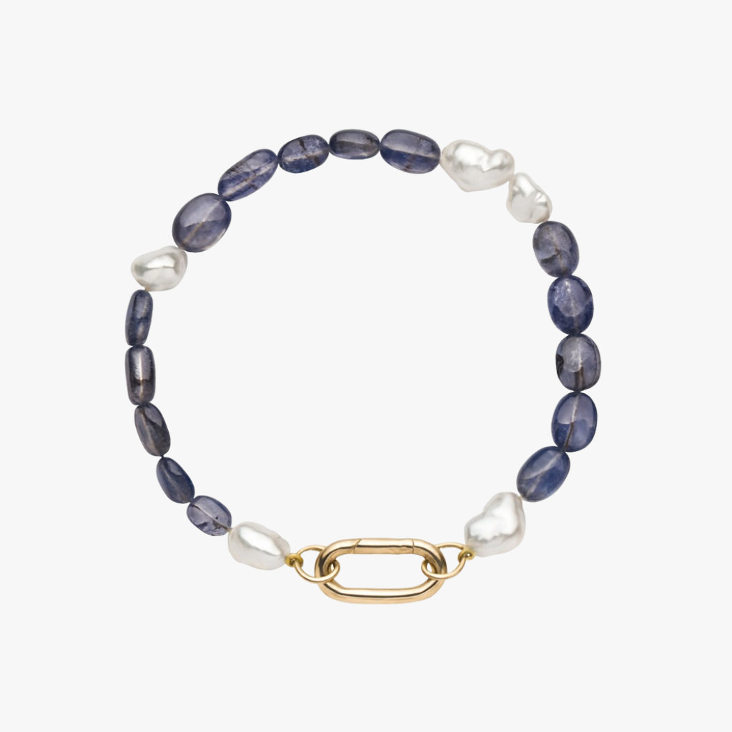 Handcrafted bracelet of Keshi South Sea pearls and Iolite gemstones with  9kt gold hinged clasp designed for personalising with your own charms.