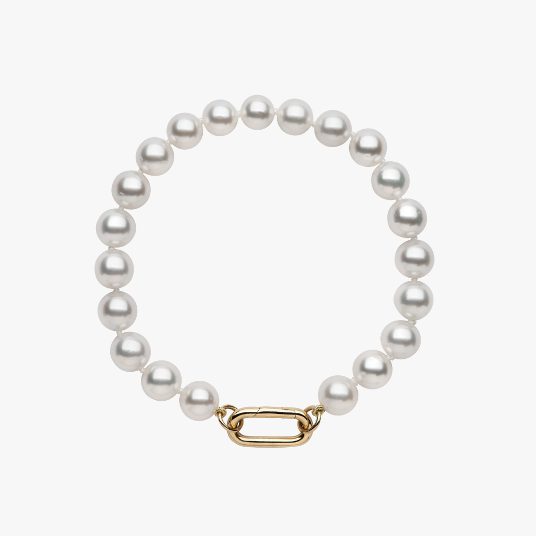 Handmade South Sea Pearl bracelet with 9kt gold hinged clasp for adding your own charms.