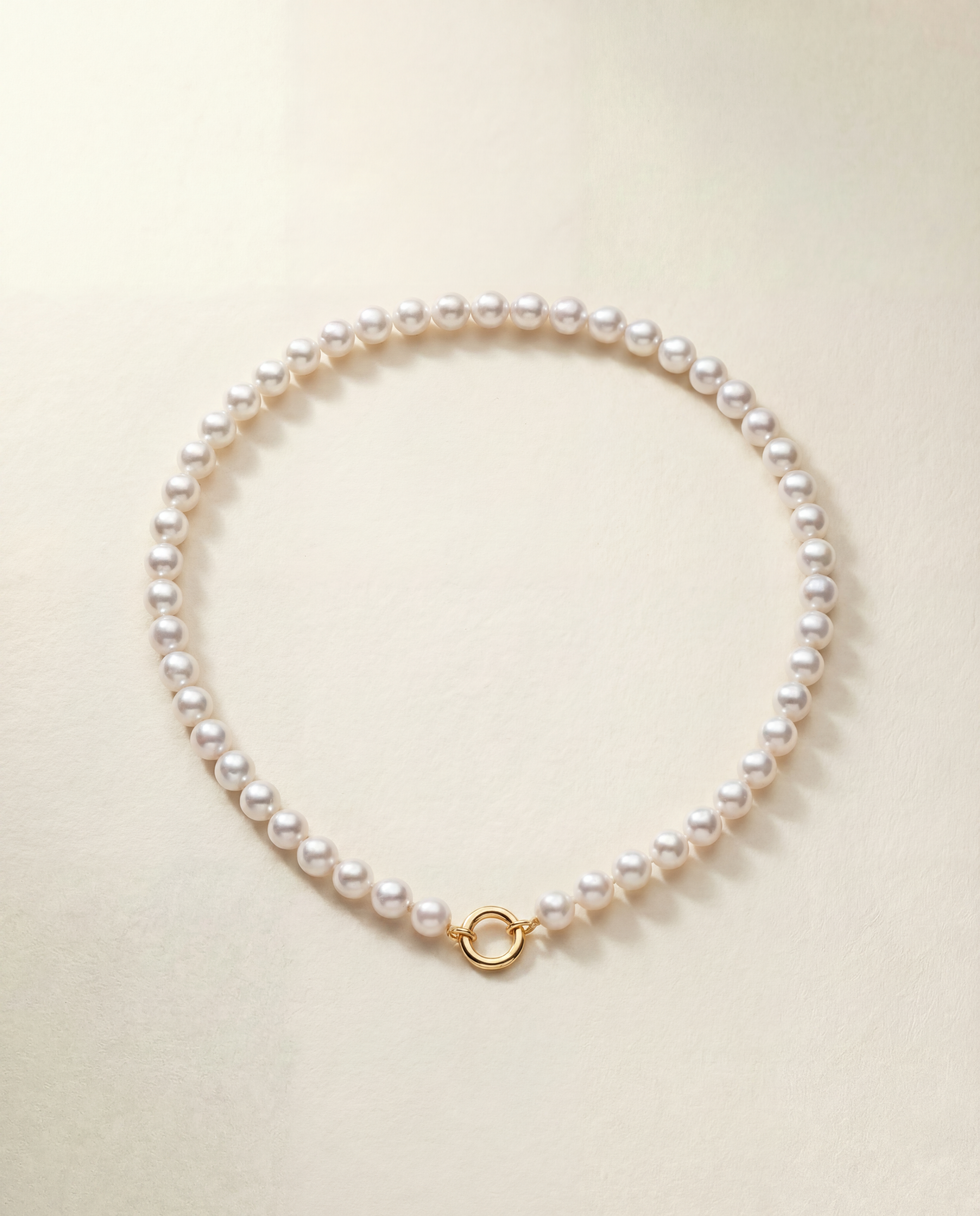 South Sea Round Pearl Strand on beige background