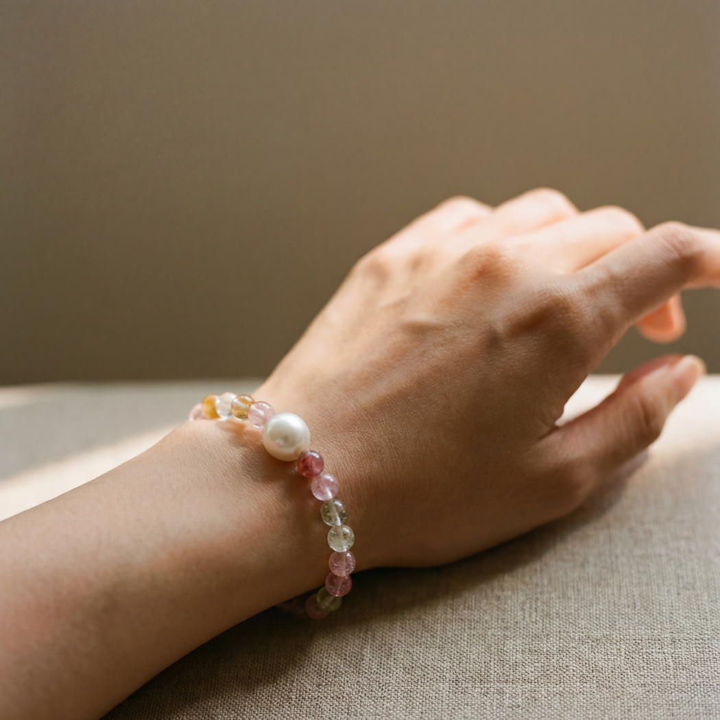 watermelon quartz and south sea pearl bracelet on model 