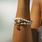 Handmade South Sea Keshi pearl bracelets with 9k gold clasp and Pink and Blue Sapphire charms.